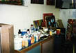 Some of the paints and supplies Joshua Jonathan uses to make his art.